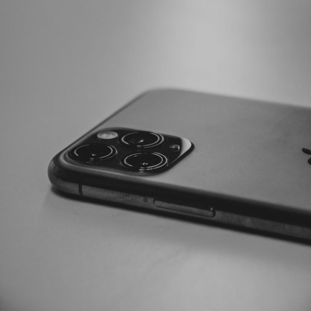 Black and white close-up of a smartphone camera