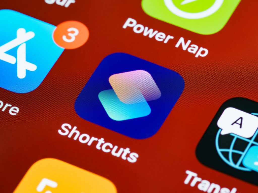 Close-up of an iPhone home screen with app icons