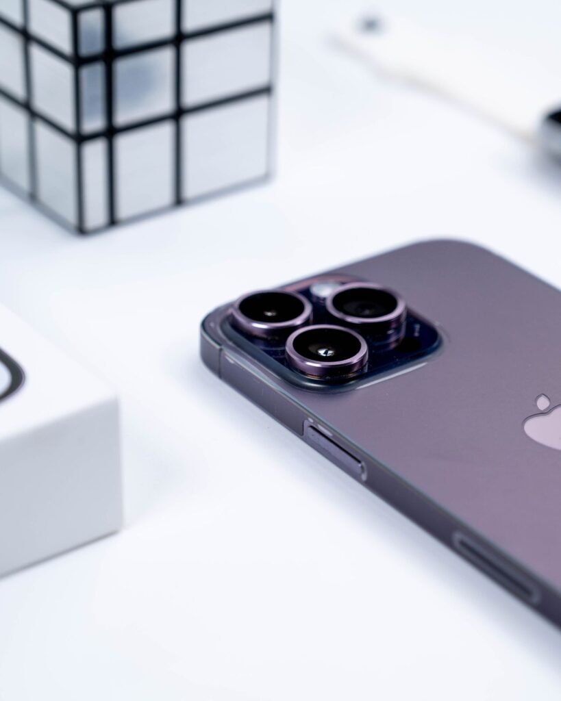Smartphone with dual camera lenses on a white background